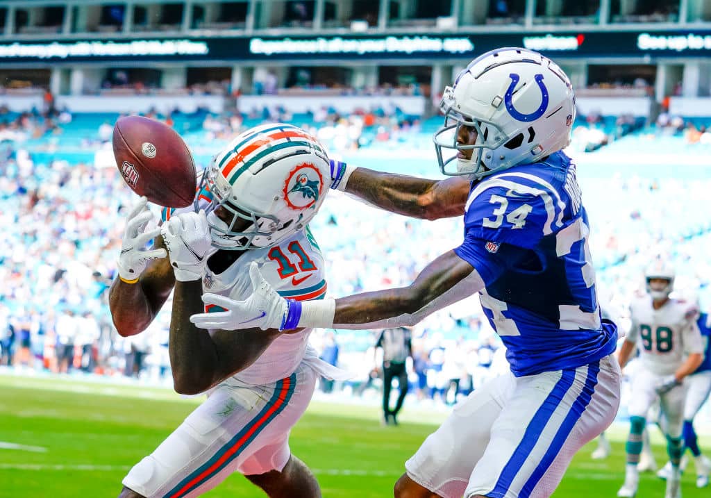 DeVante Parker battles with a Colts cornerback in the end zone as he is thrown the football