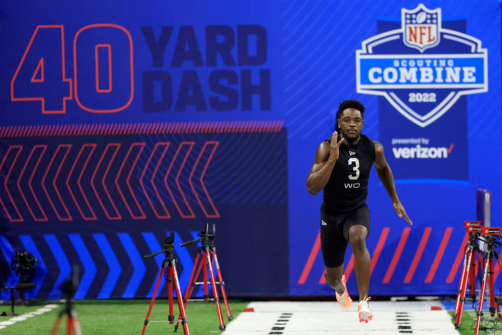 Purdue's David Bell sprints in the 40 yard dash at the NFL Combine