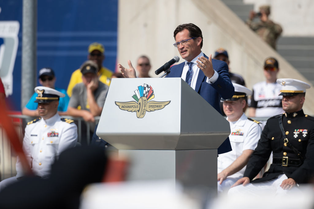 Doug Boles speaking in front of IMS podium
