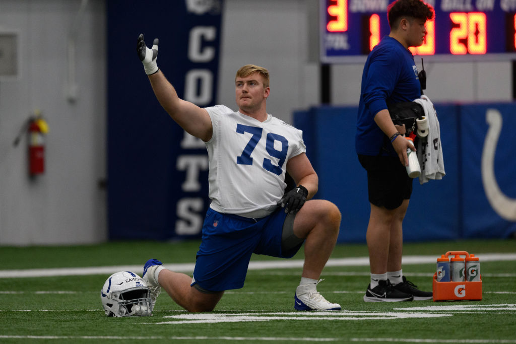 Colts offensive tackle Bernhard Raimann stretches before practice.