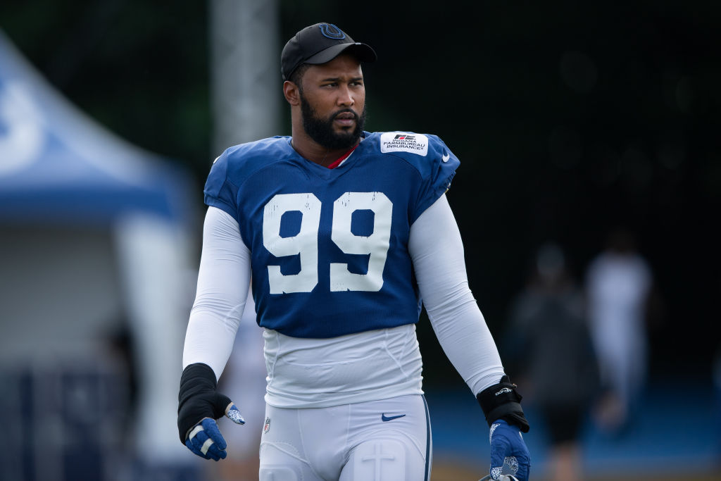 DeForest Buckner walks around the practice field during practice.