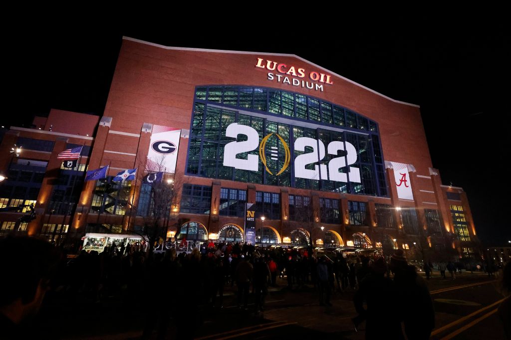 Exterior picture of Lucas Oil Stadium with CFP decor on building