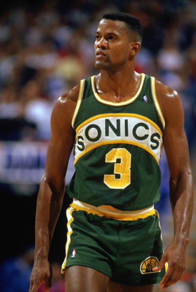 Dale Ellis walks on the court