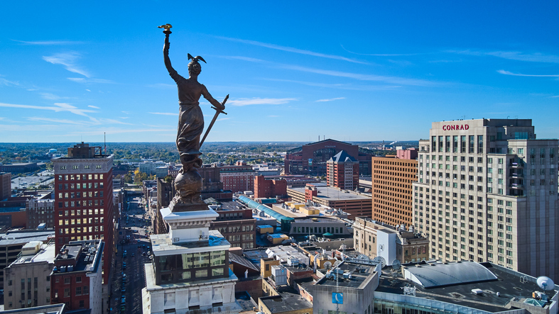 Aerial at top of Soldiers & Sailors Monument with downtown Indianapolis surrounding