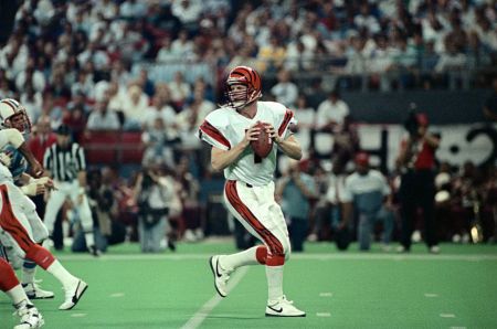 Football Player Boomer Esiason in Action