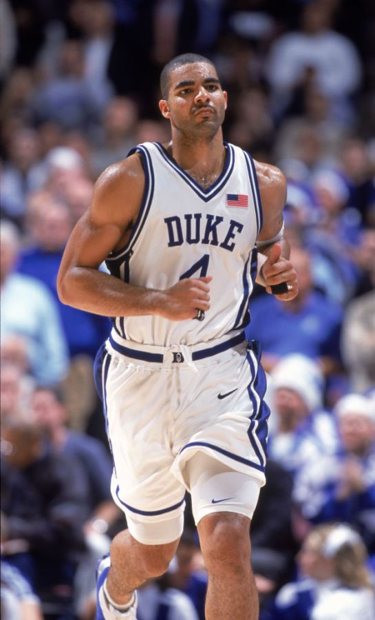 Carlos Boozer runs down the court