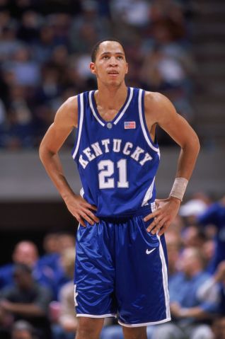 Tayshaun Prince stands on the court