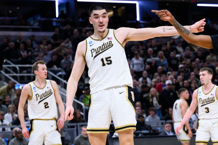 Photos of Zach Edey Because He Is "Just Tall"