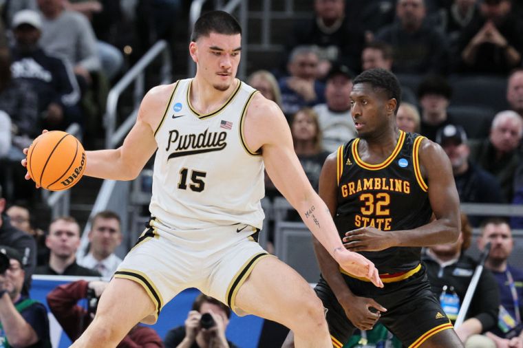 Photos of Zach Edey Because He Is "Just Tall"