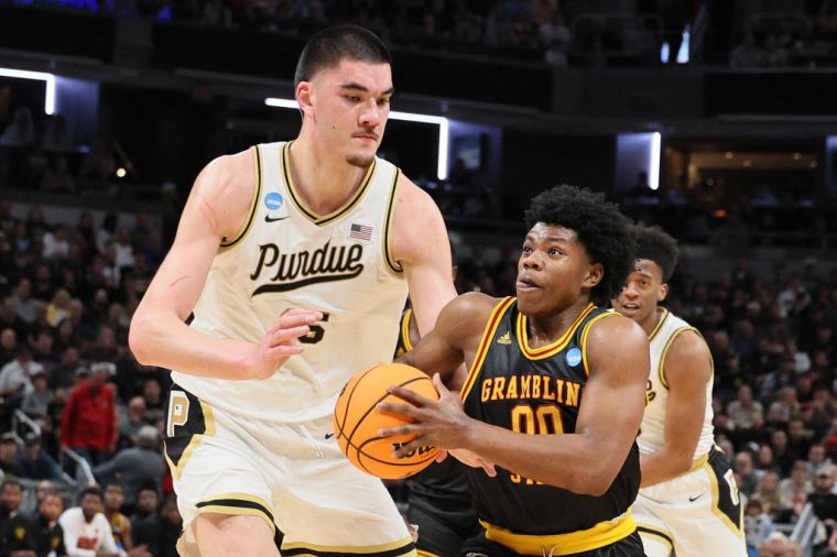 Photos of Zach Edey Because He Is "Just Tall"