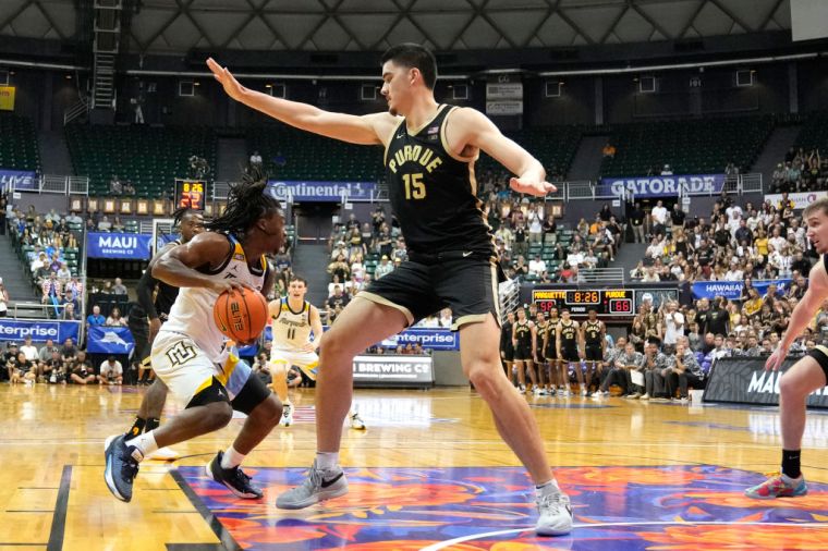 Photos of Zach Edey Because He Is "Just Tall"