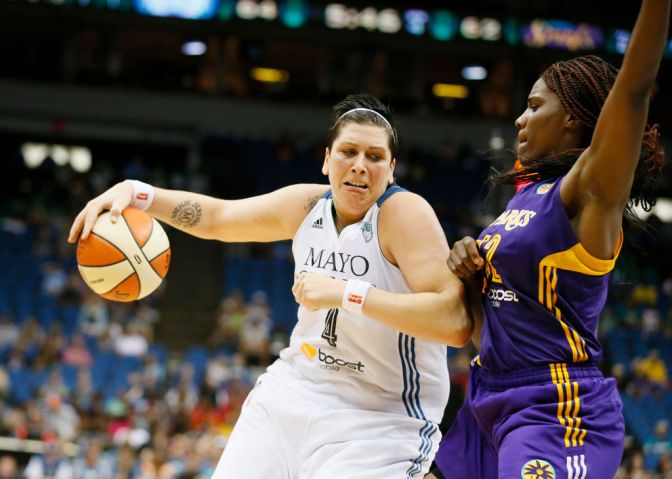 Janel McCarville drove to the basket on Jantel Lavender during WNBA action between the Minnesota Lynx and Los Angeles Sparks at Target Center Tuesday July 8th 2014 in Minneapolis, MN. ] Jerry Holt Jerry.holt@startribune.com