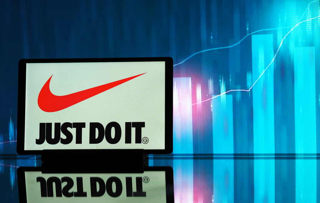 In this photo illustration, a Nike, Inc. logo is seen...