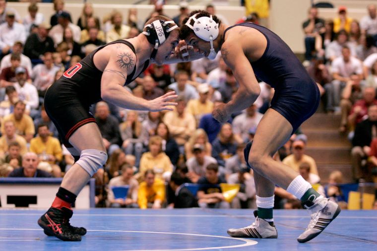 Compete in a wrestling meet with an 'I suck at fantasy football' singlet