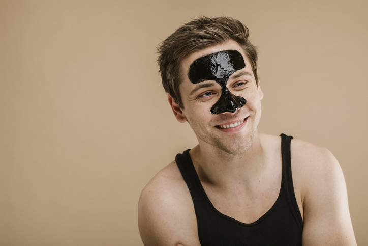 Happy man wearing a nose mask