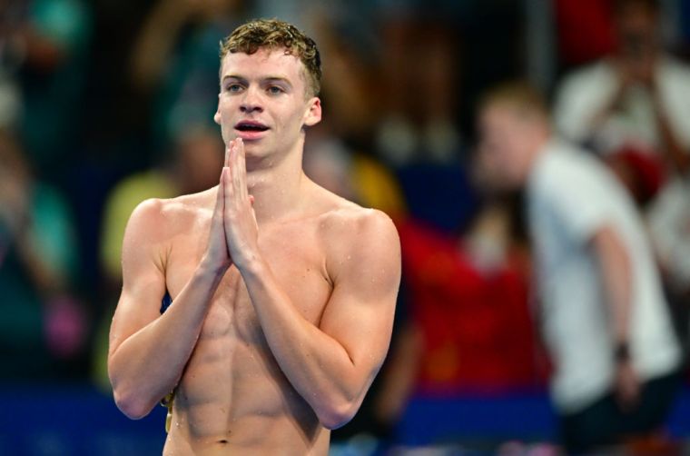 Leon Marchand Puts France on His Back