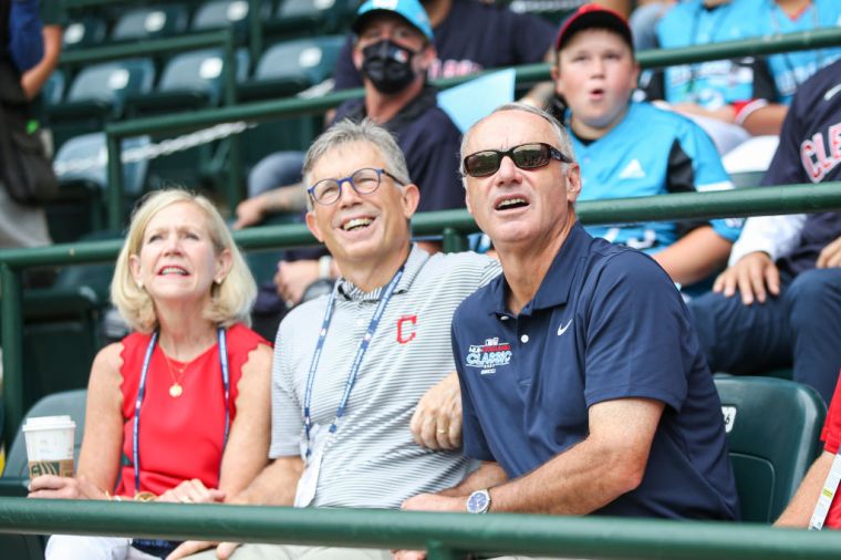 Larry Dolan (center)