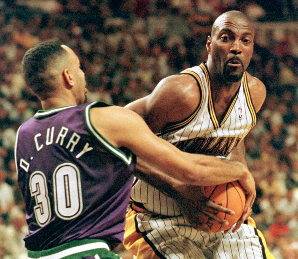 Indiana Pacers forward Dale Davis (R) struggles fo