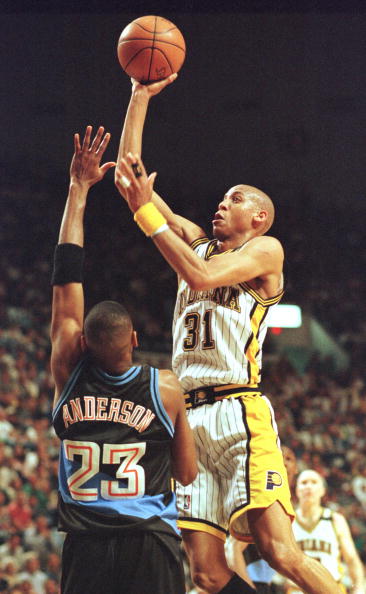 Indiana Pacers guard Reggie Miller (31) shoots ove