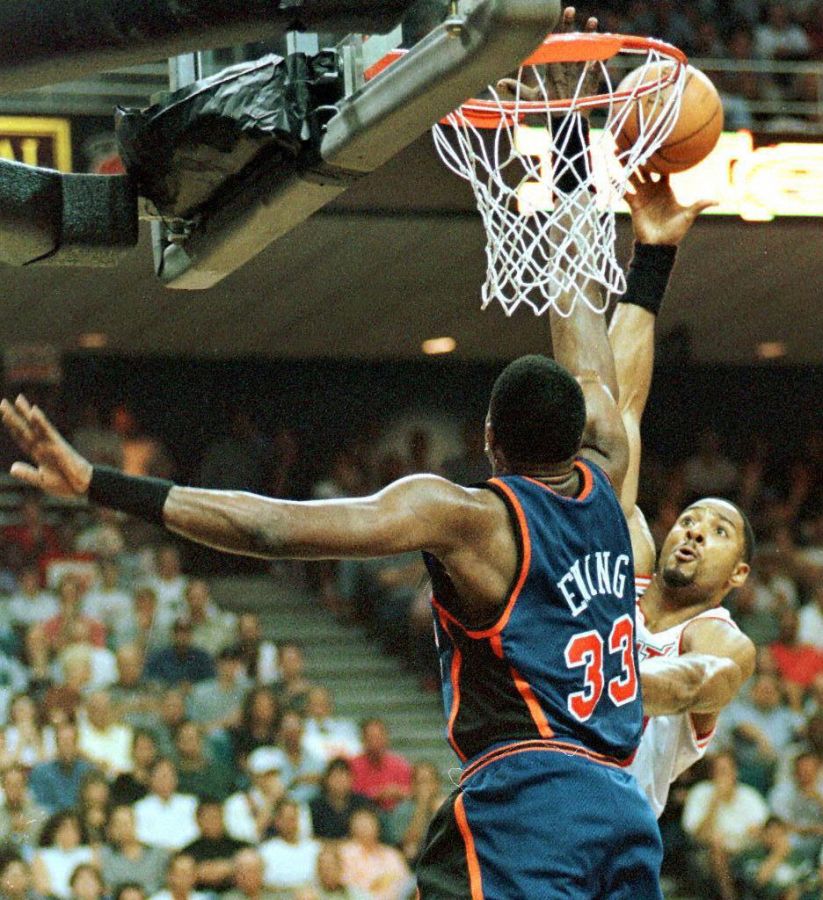 Miami Heat center Alonzo Mourning shoots the ball