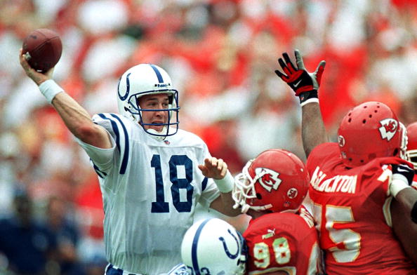 Indianapolis Colt quarterback Peyton Manning (L) f