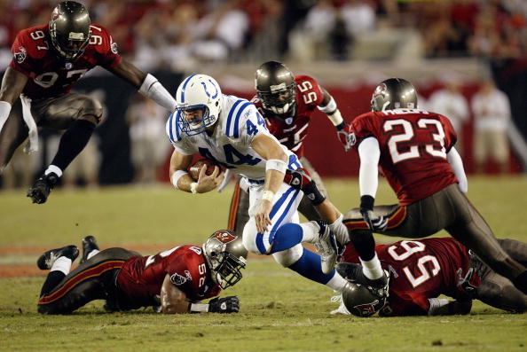 Dallas Clark finds a hole to run through
