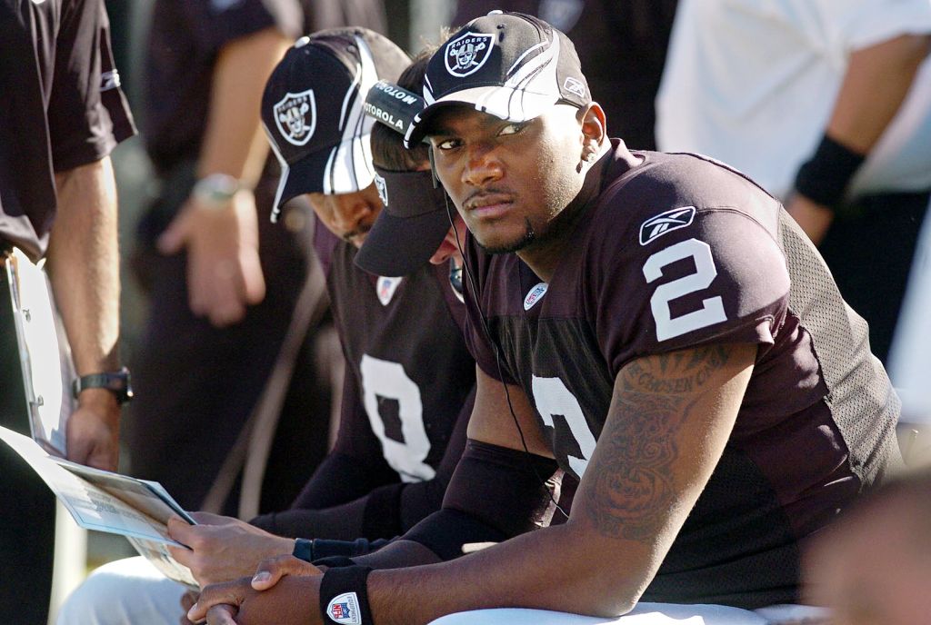 First round draft pick JaMarcus Russell waits his turn on the bench as the Raiders lost to the Kansas City Chiefs 12-10 at McAfee Coliseum in Oakland, Calif. on Sunday, October 21, 2007(Dan Honda/Contra Costa Times)