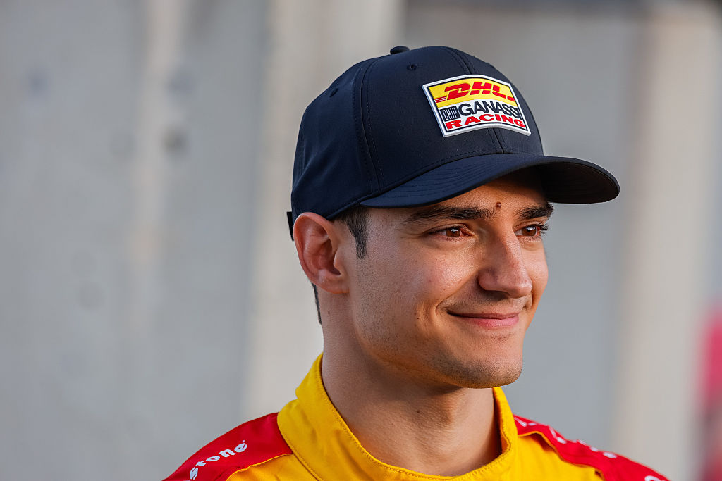 Alex Palou (#10 Chip Ganassi Racing Honda) talks to the