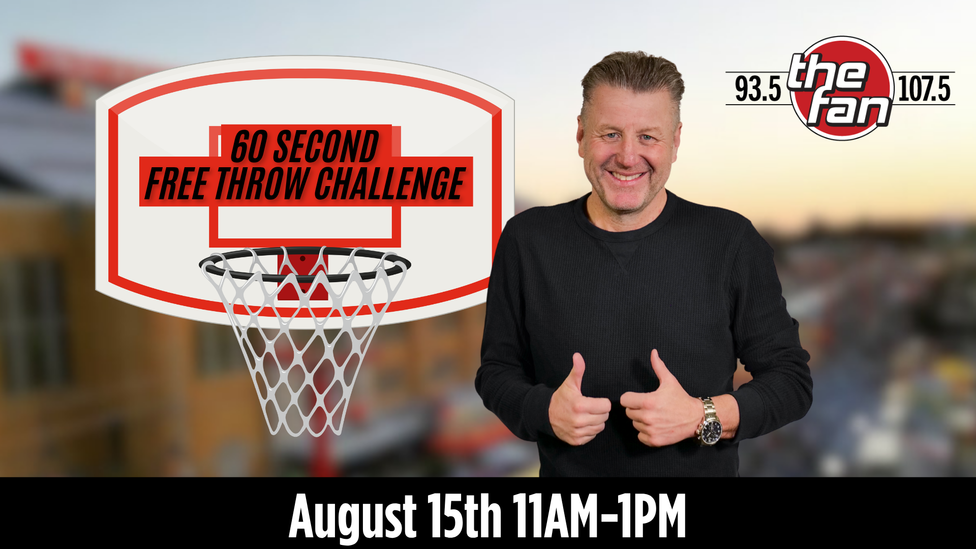 A man in a black shirt standing in front of a basketball hoop with a sign that says "60 Second Free Throw Challenge" and the logo for "The Fan 93.5 107.5" radio station.